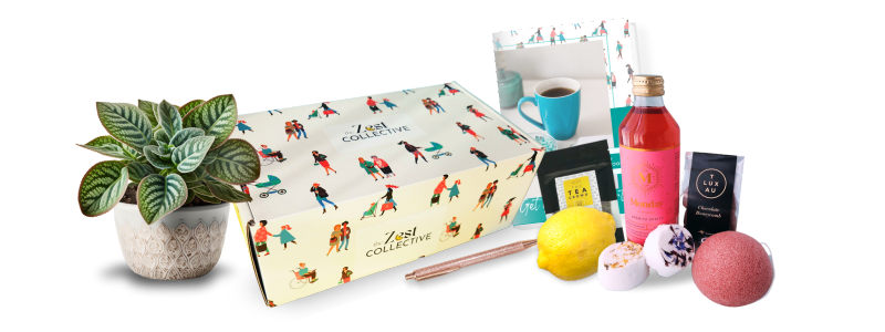 A Zest Self Care Box: a white box covered in illustrations of women. It is surrounded by products including a non-alc cocktail, facial sponge, and other self care products. 