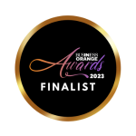 Round award badge, white text and gold accents on black background with rainbow text based logo. Finalist - Business In Orange Awards 2023.